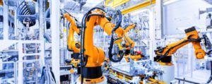 Japan robots plan: industrial robot arms on a manufacturing line