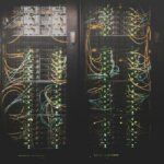 Rows of servers in a data center facing cooling pressure from data center heat waves