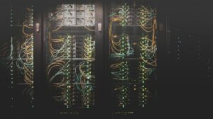 Rows of servers in a data center facing cooling pressure from data center heat waves