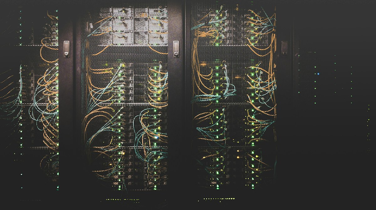 Rows of servers in a data center facing cooling pressure from data center heat waves