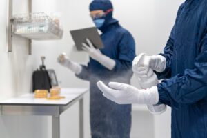 Russia plague outbreak: scientist in protective suit working in a laboratory